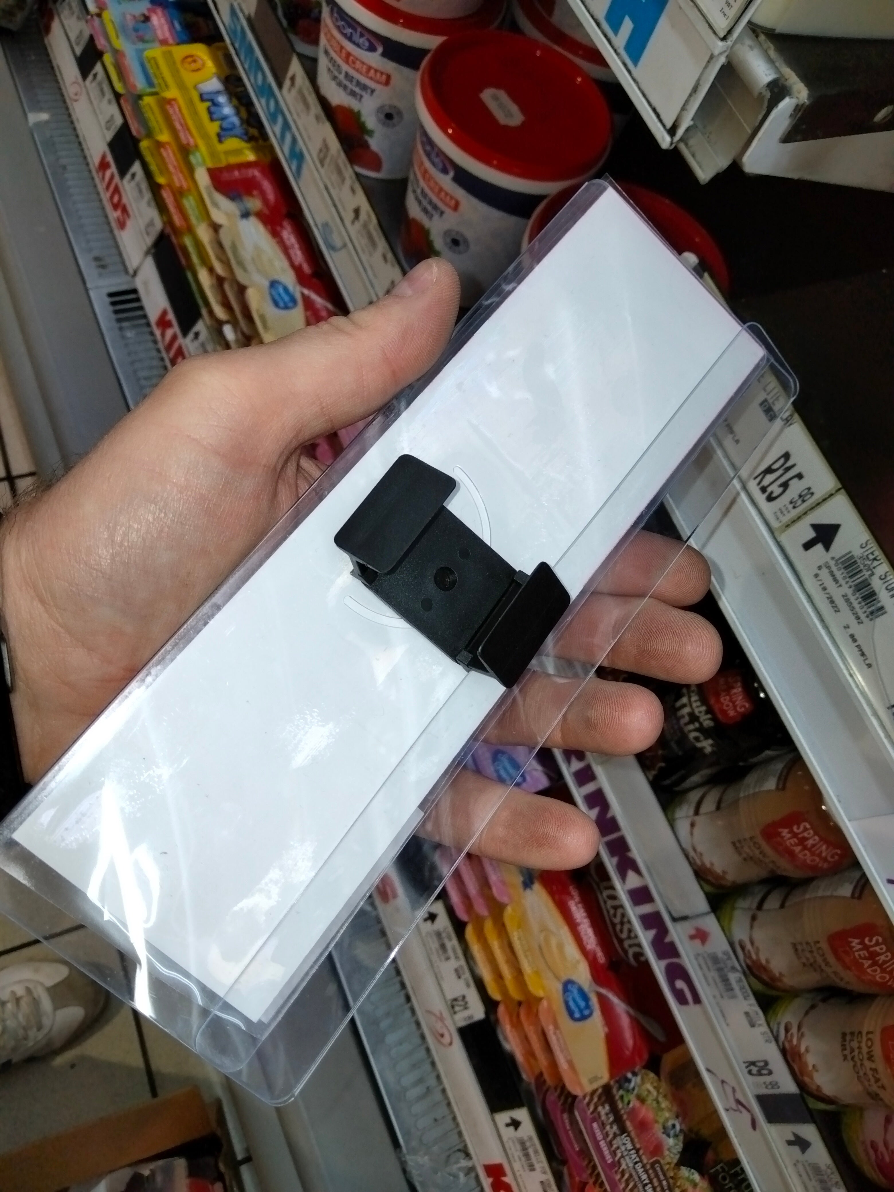 SPAR shelf talker case with clip